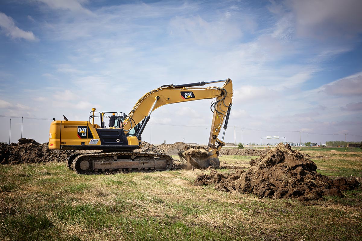 Excavator trenching ground Excavator trenching ground