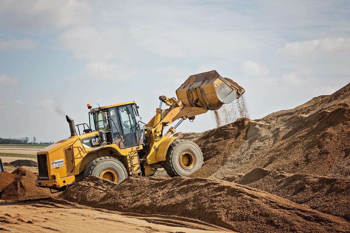 Machines moving hauling gravel